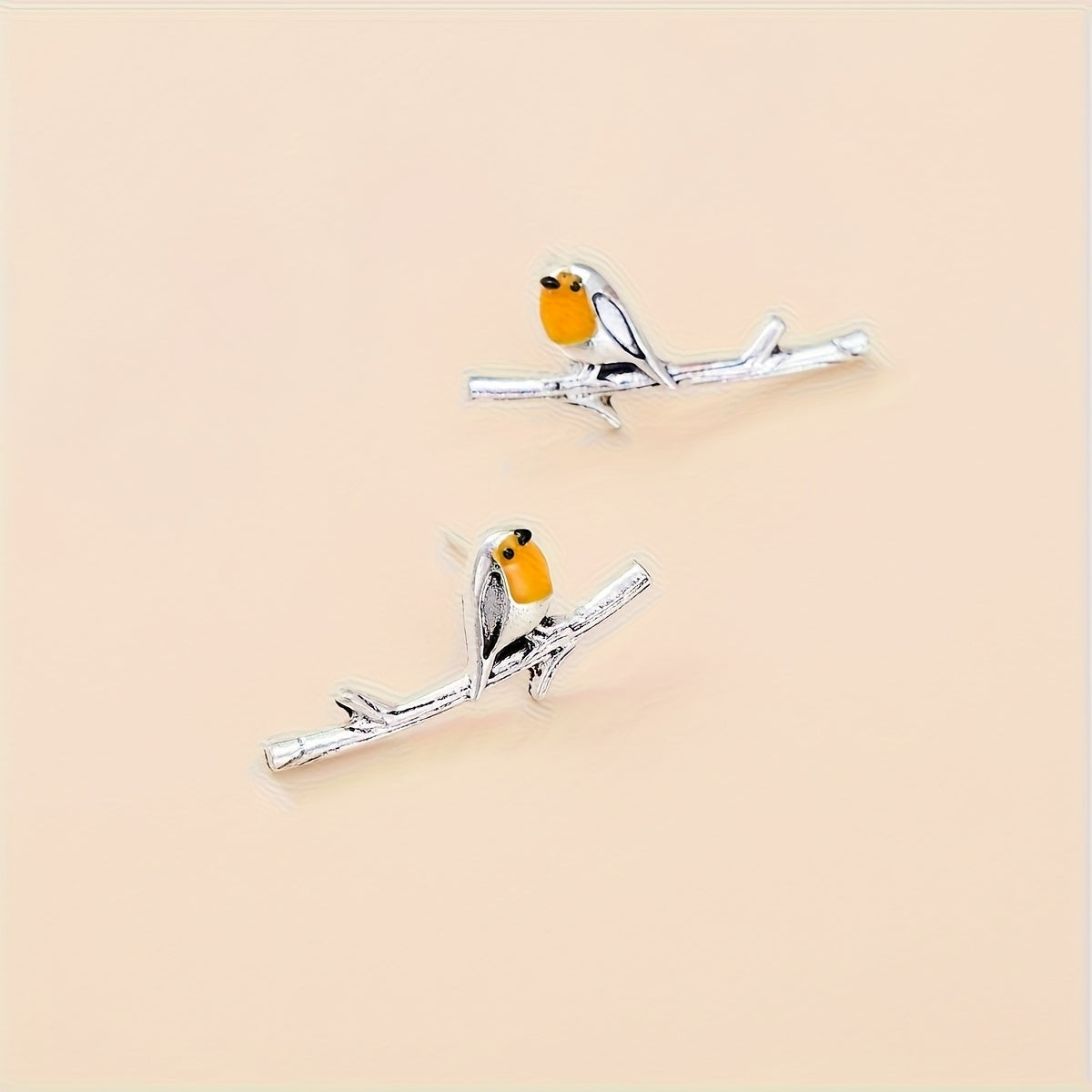 Ohrringe mit Vogel-Motiv - Haller