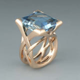 Vintage Roségold-Ring mit blauem Zirkonia
