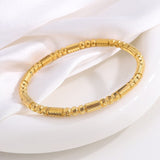 Betörendes verschlungenes Gold-Armband