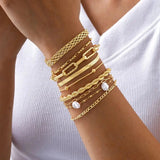 Stapelbares goldenes Perlen-Armband-Set