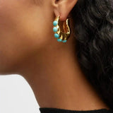 Auffällige skulptierte Türkis-Stein-Creolen