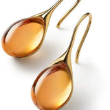 Kristall-Ohrhänger in Gold und Silber