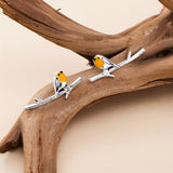 Ohrringe mit Vogel-Motiv - Haller