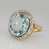 Goldring mit rundem blauem Glas