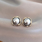 Edle Ohrringe mit schwarzer Perle - Haller